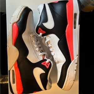 Nike Black and White Sneakers with Bright Pink Highlights